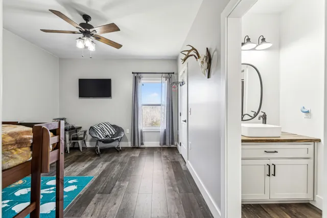 a kitchen with stainless steel appliances a refrigerator and a stove