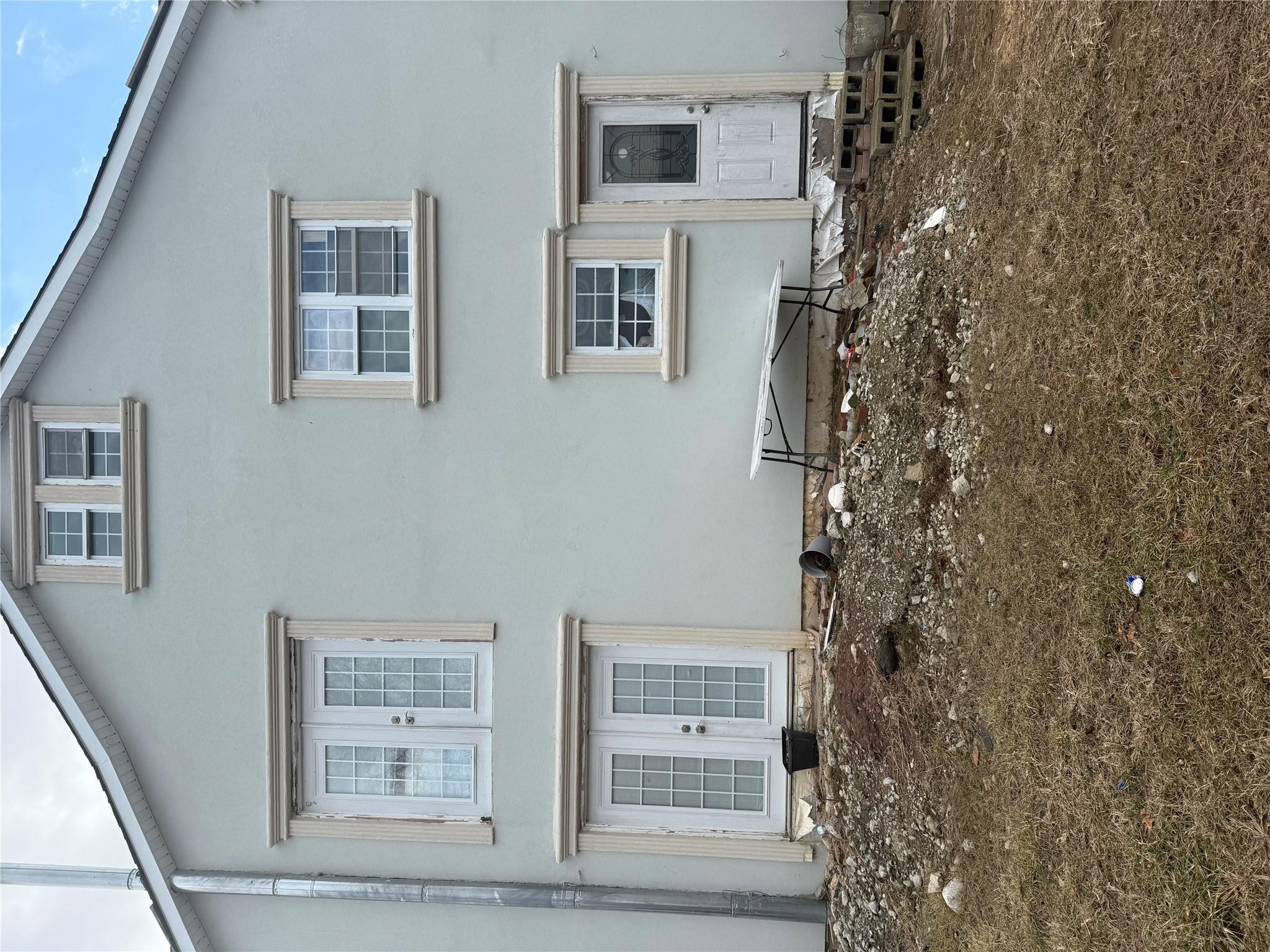 296 Pine Street Freeport, NY 11520 - Photo 2 of 4 a view of an entrance of house