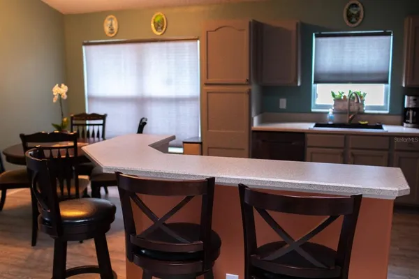 a table and chairs in a kitchen