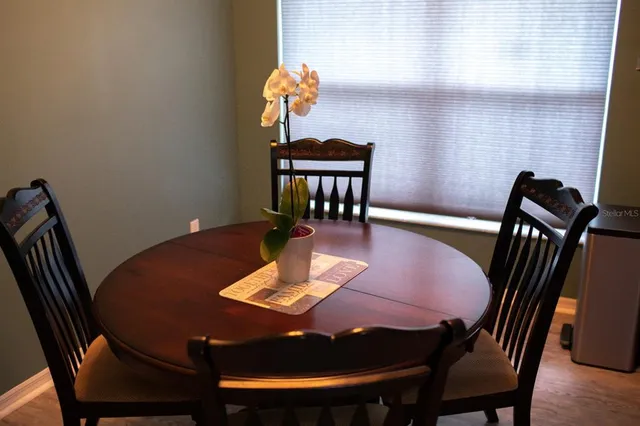 a view of a dining room with furniture