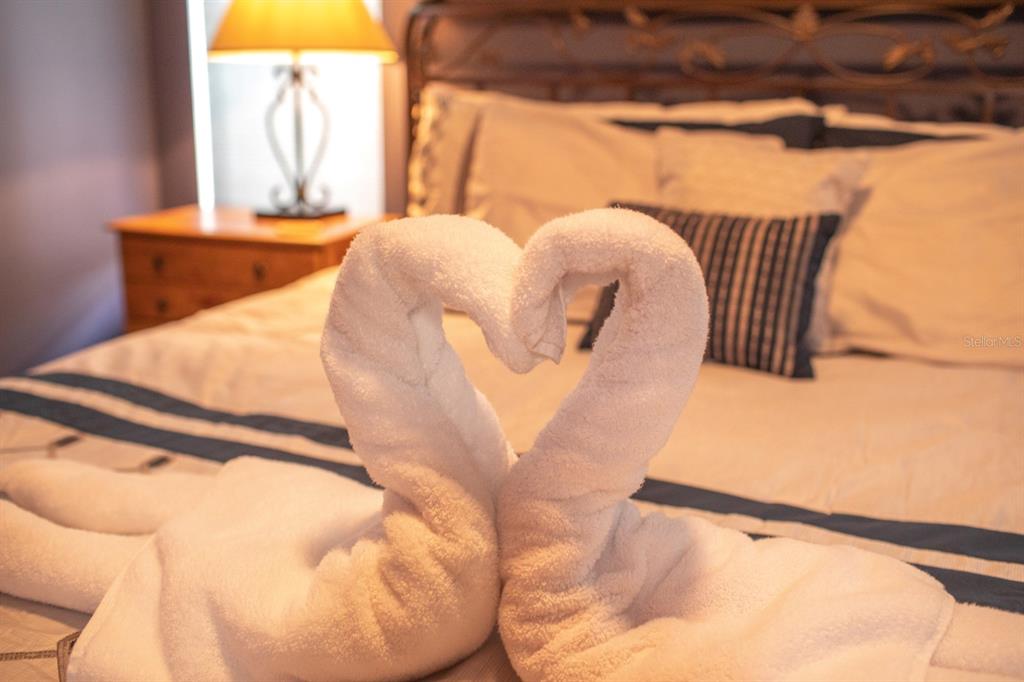 2577 Oneida Loop Kissimmee, FL 34747 - Photo 16 of 36 a bedroom with a bed and window