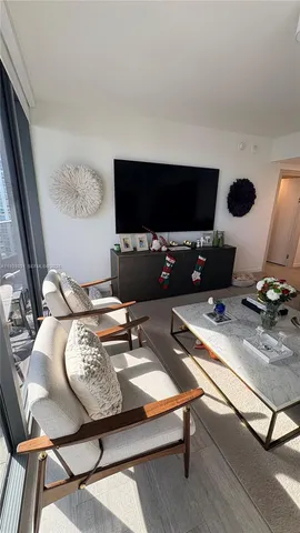 a kitchen with a sink and a stove top oven