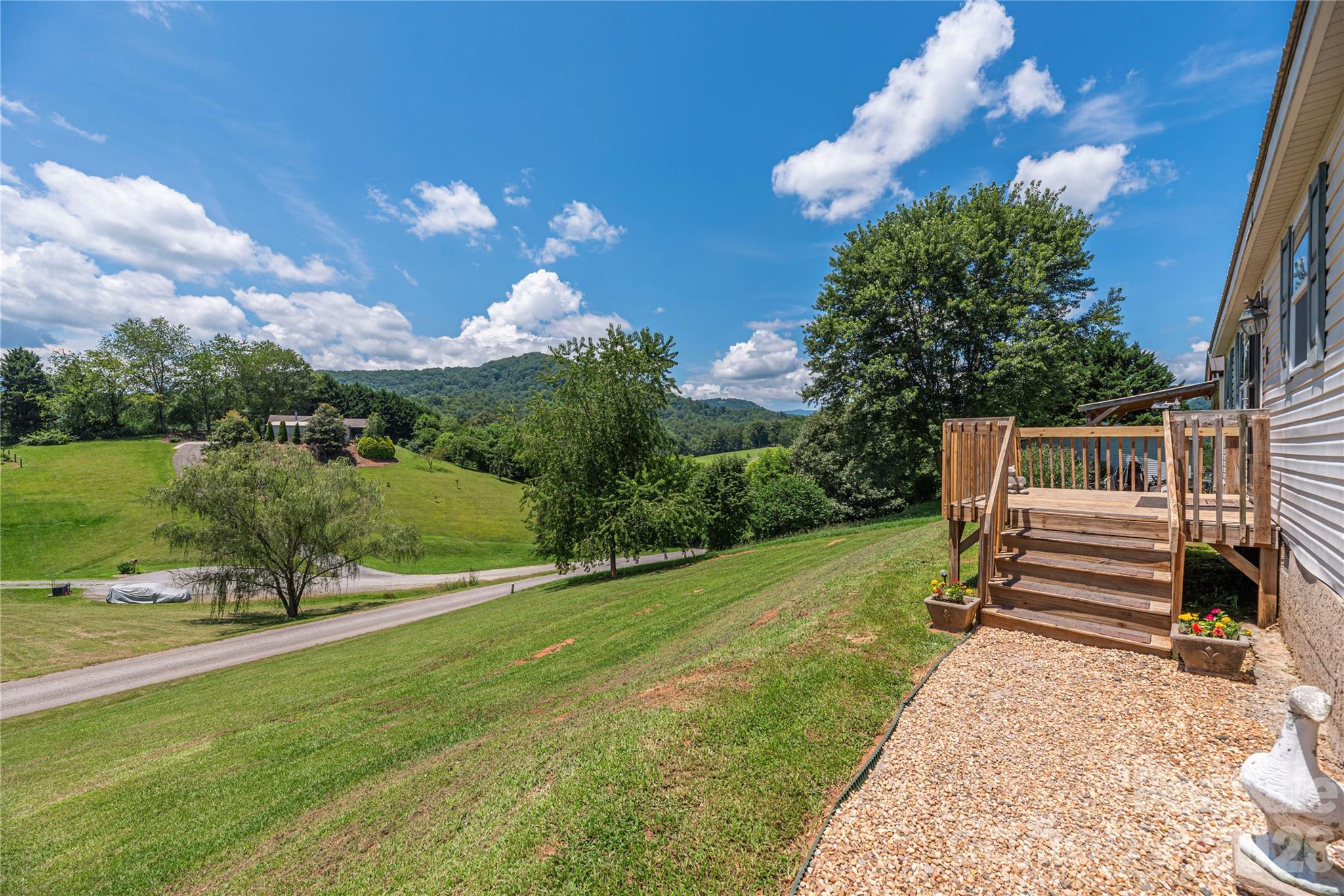 40 Farmstead Road Leicester, NC 28748 - Photo 21 of 29 a view of a park with large trees