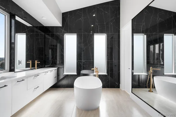 a bathroom with a sink and a shower