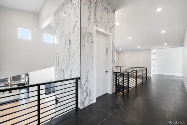 a bathroom with a sink a mirror and a shower