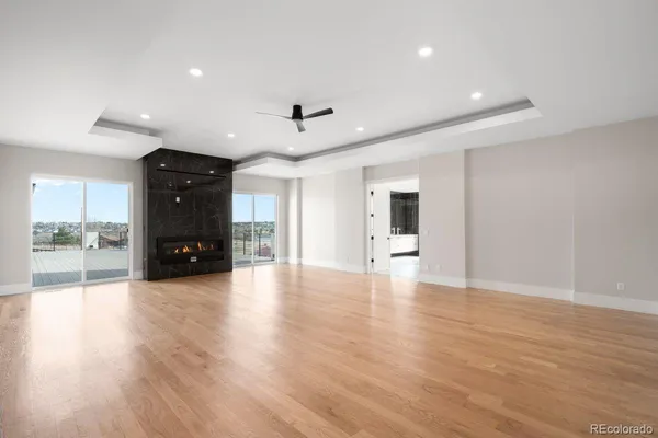 a spacious bathroom with a shower and a sink