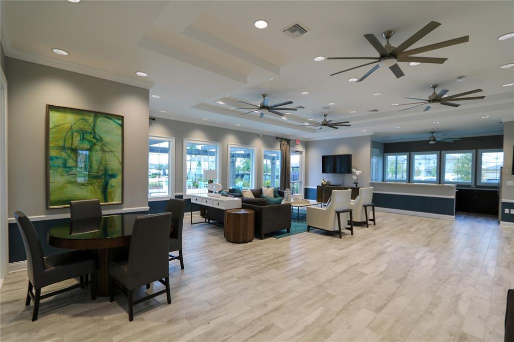4714 Norman Oak Place Tampa, FL 33619 - Photo 28 of 32 a living room with furniture and a large window
