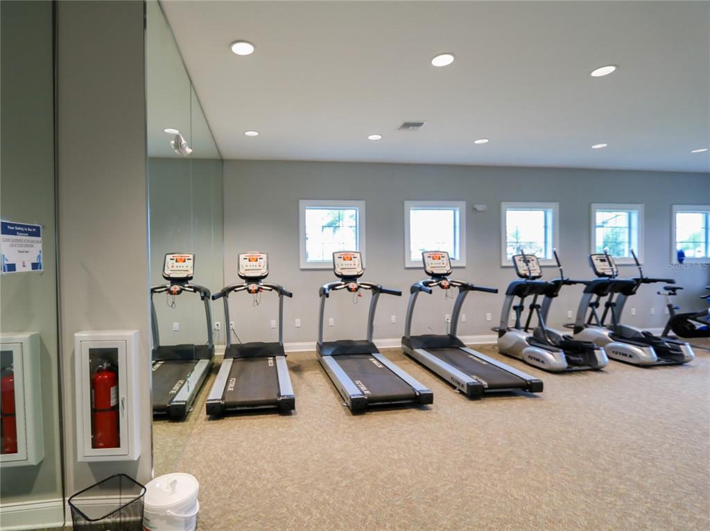 4714 Norman Oak Place Tampa, FL 33619 - Photo 29 of 32 a view of a room with gym equipment