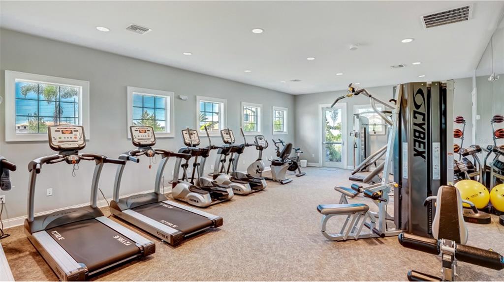 4714 Norman Oak Place Tampa, FL 33619 - Photo 31 of 32 a view of a room with gym equipment