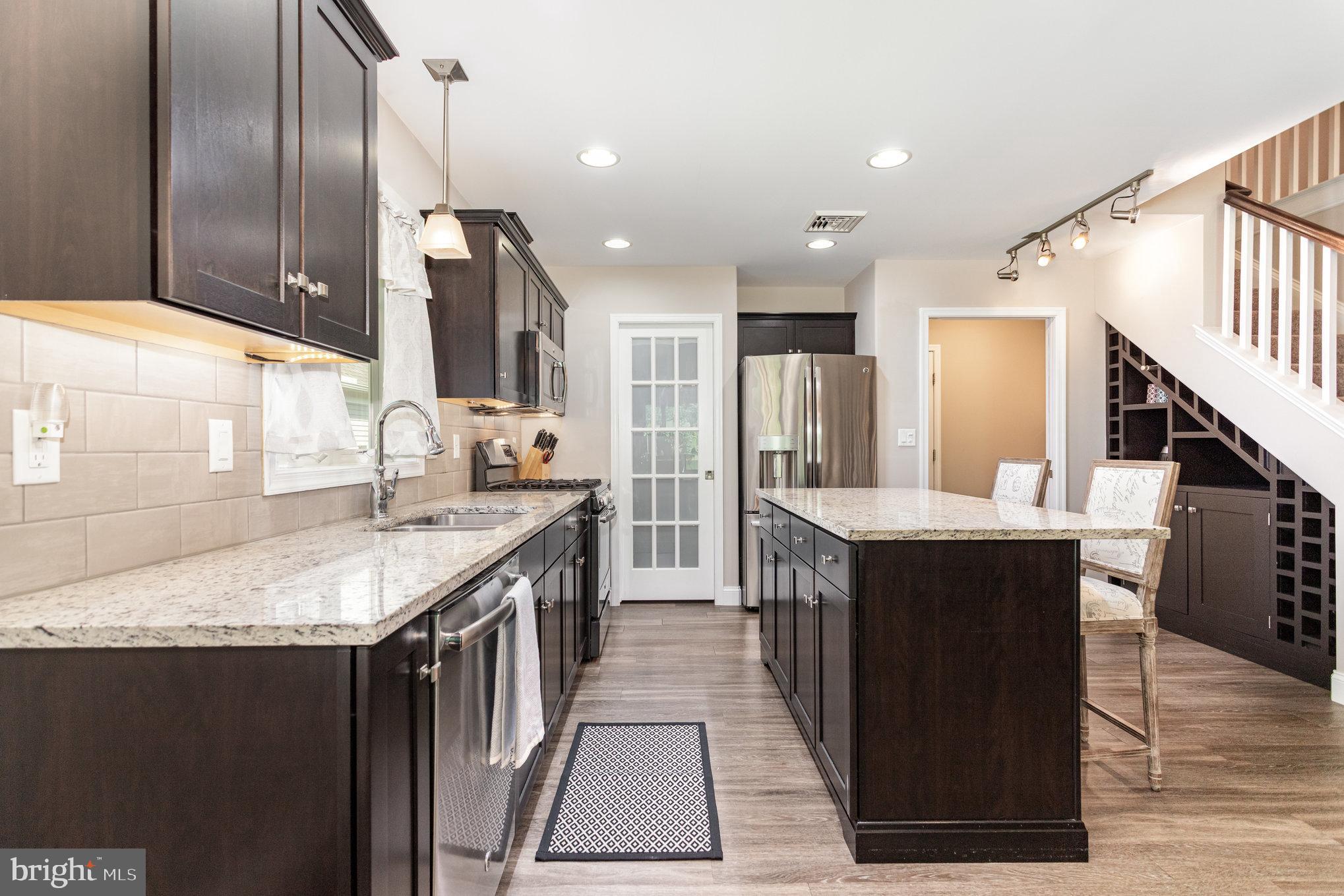 1134 Alden Way Lebanon, PA 17042 - Photo 12 of 41 a kitchen with stainless steel appliances granite countertop a sink and a refrigerator