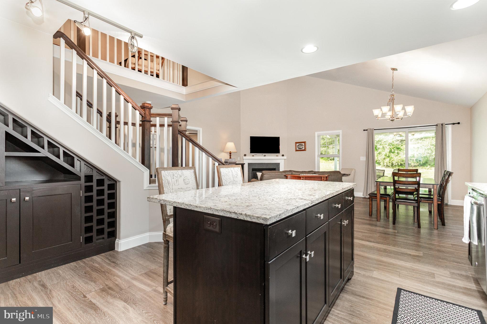 1134 Alden Way Lebanon, PA 17042 - Photo 13 of 41 a kitchen with stainless steel appliances kitchen island a dining table chairs and a view of living room