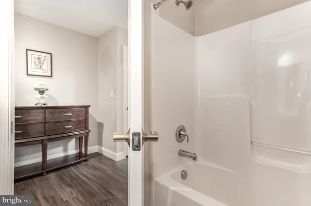 a view of storage and utility room with washer and dryer