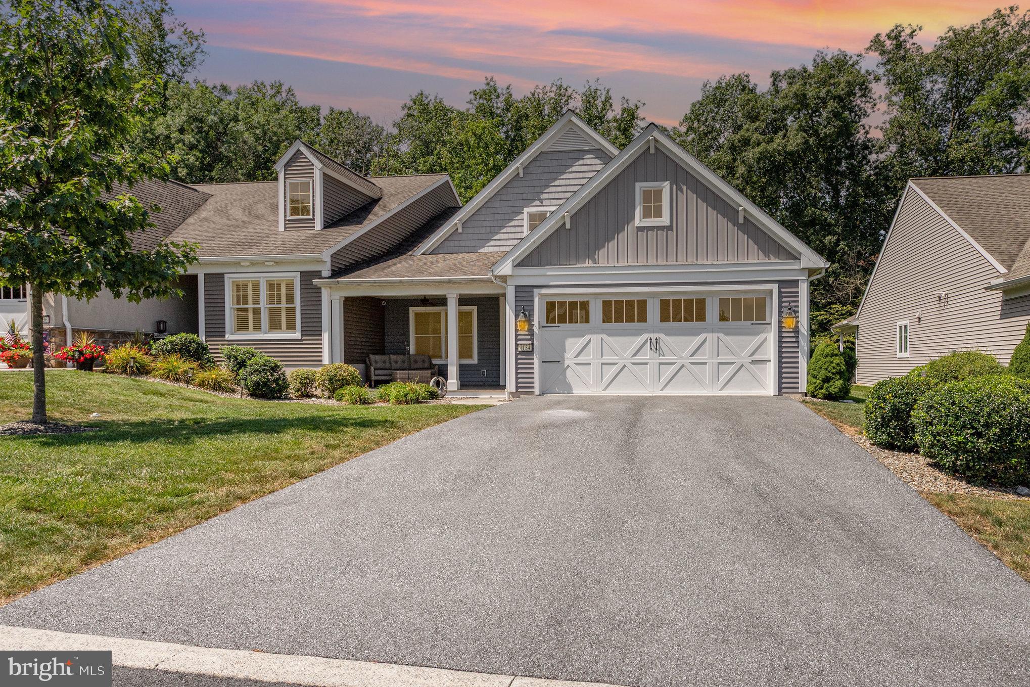 1134 Alden Way Lebanon, PA 17042 - Photo 37 of 41 a front view of a house with a yard and garage