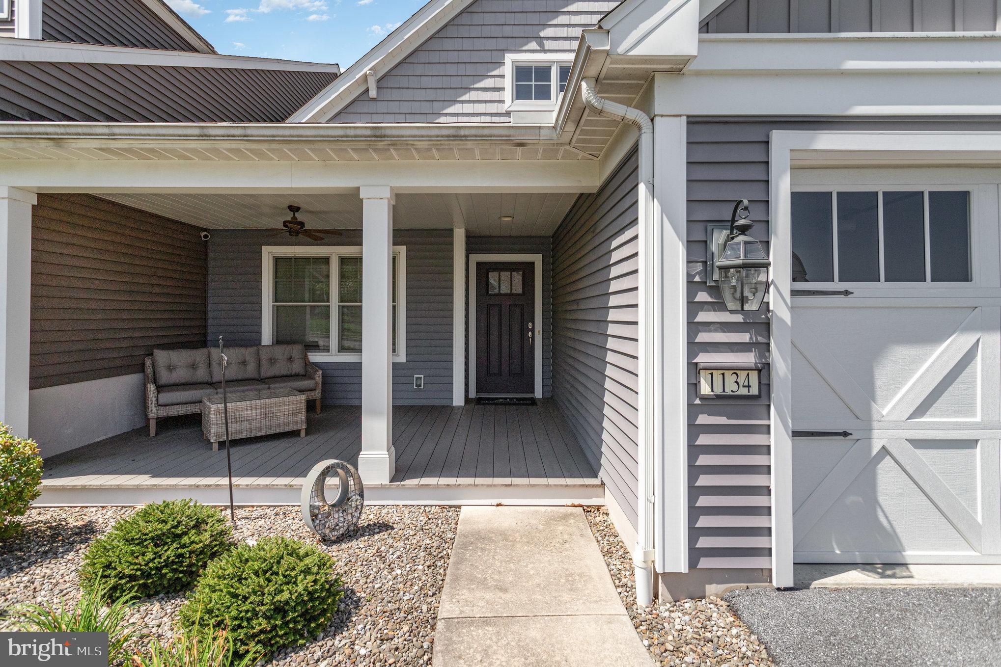 1134 Alden Way Lebanon, PA 17042 - Photo 4 of 41 a view of a patio with table and chairs and potted plants