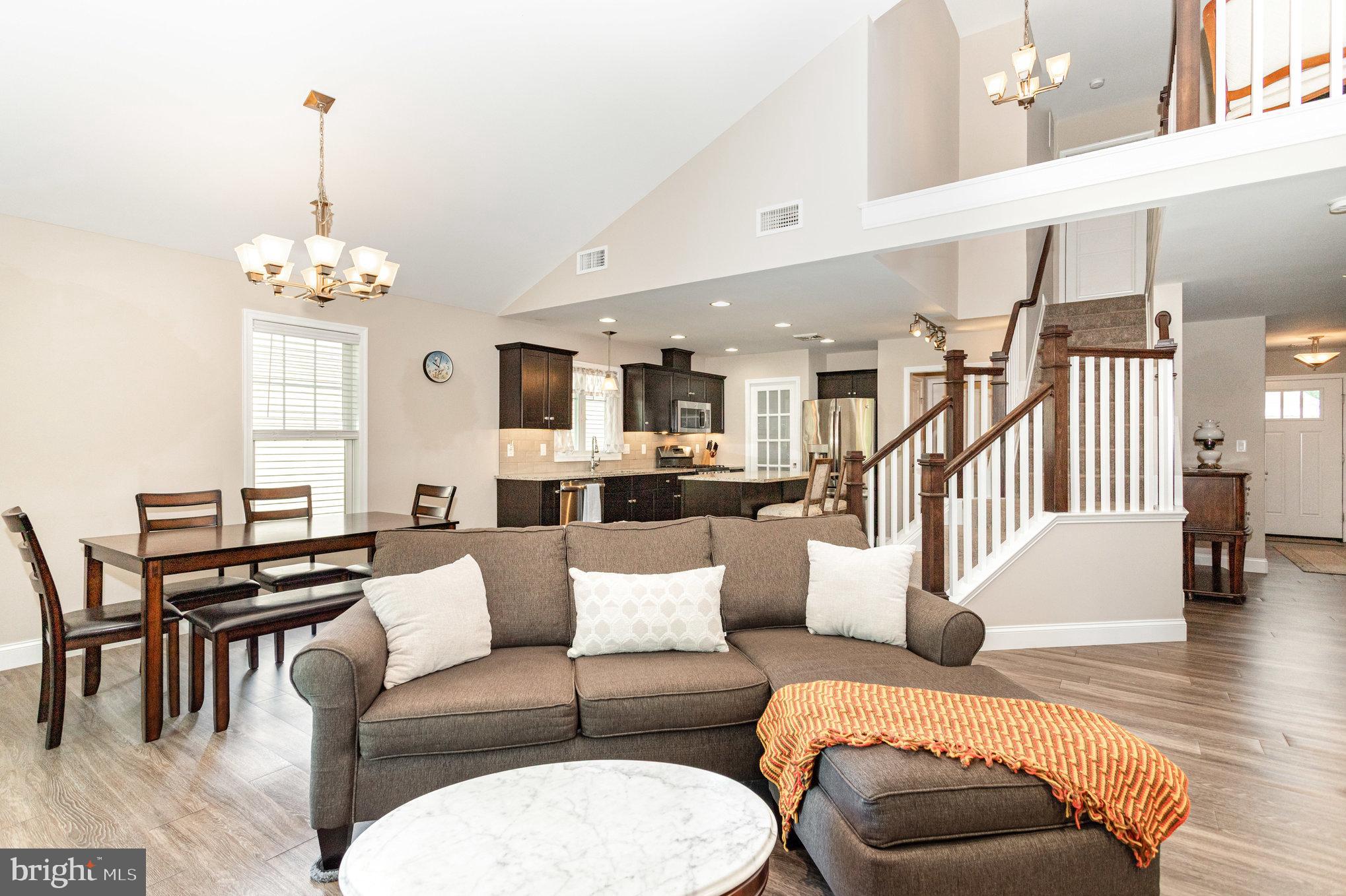 1134 Alden Way Lebanon, PA 17042 - Photo 38 of 41 a living room with furniture and a chandelier