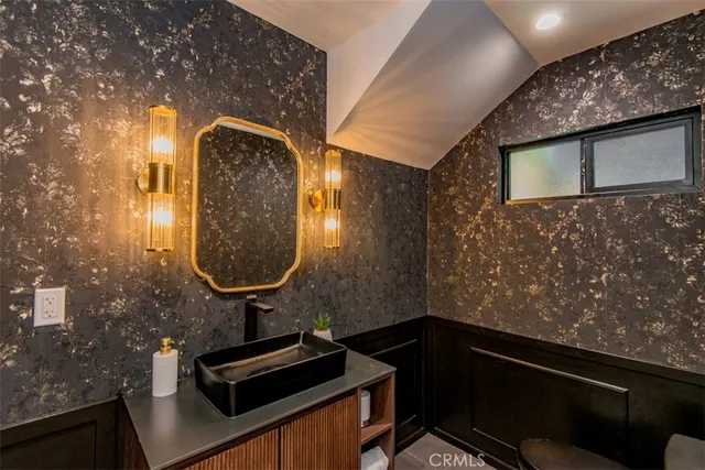a view of staircase with wooden floor and a potted plant