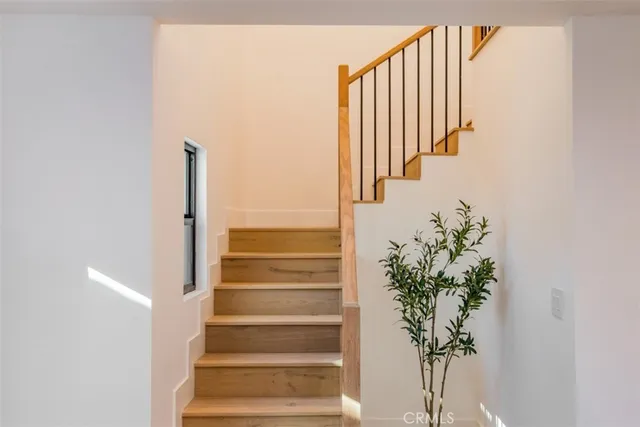 a view of a hallway with a chandelier