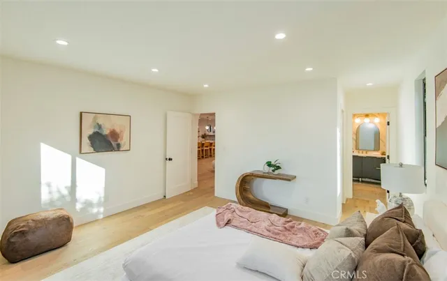 a bathroom with a double vanity sink mirror and shower