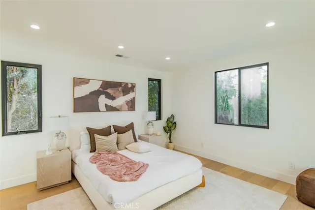 a view of a hallway view with staircase