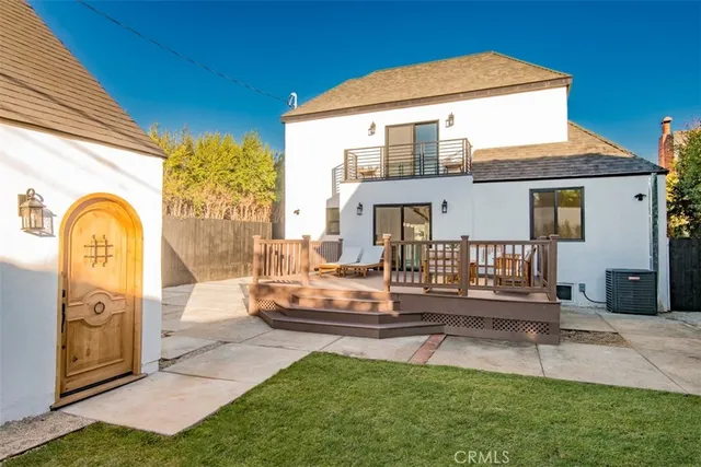 a kitchen that has a sink and a stove
