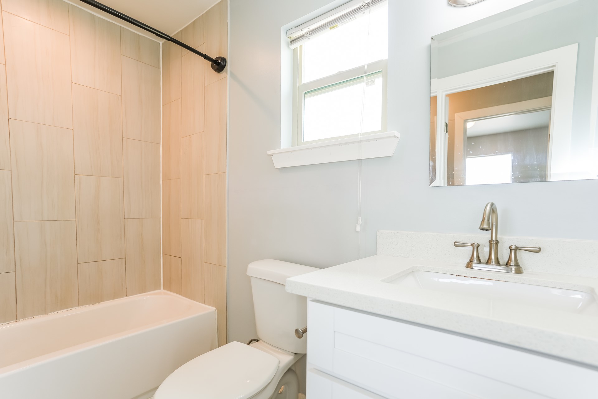 4801 Avenue H Austin, TX 78751 - Photo 11 of 16 Bathroom featuring vanity and shower / bath combination