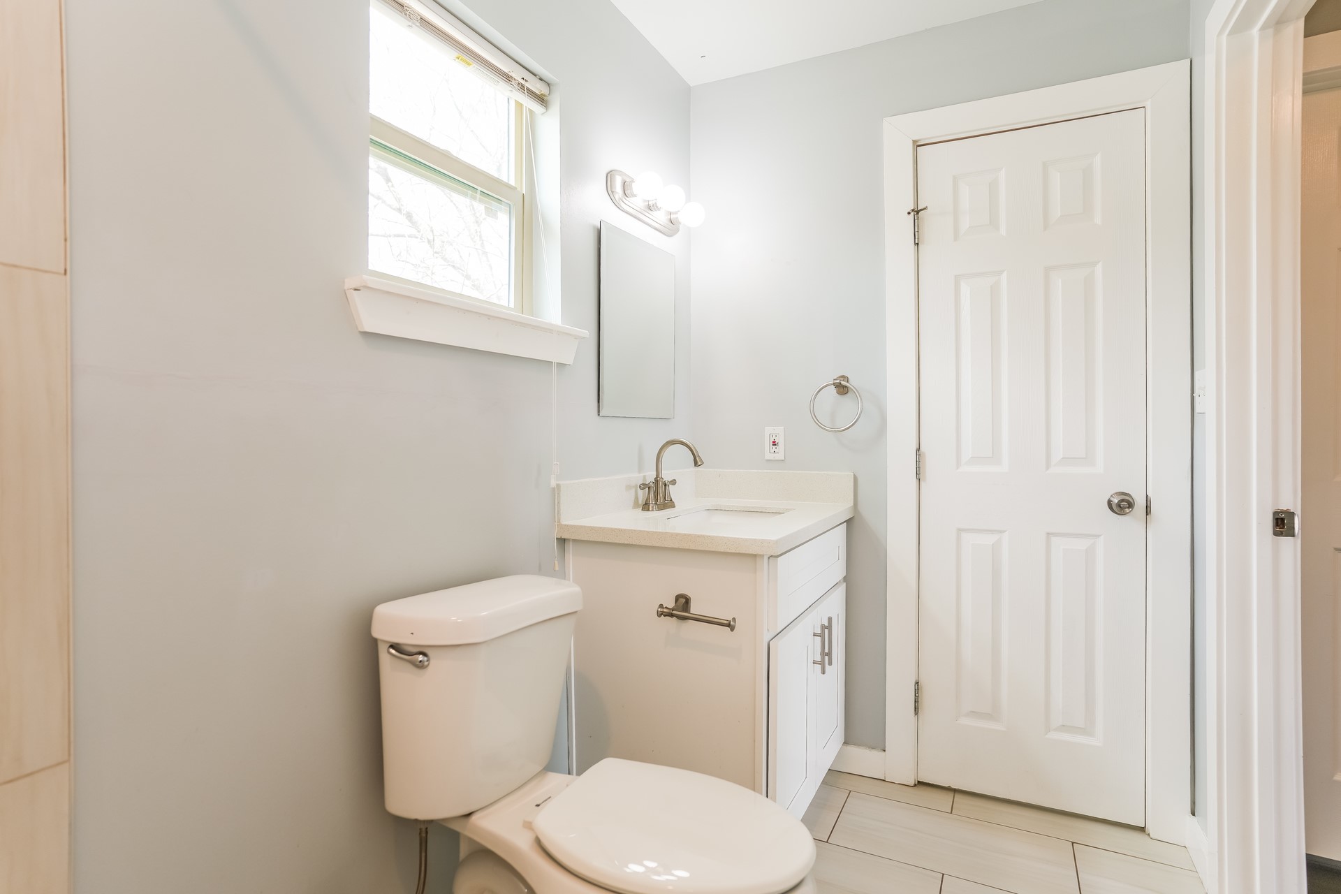 4801 Avenue H Austin, TX 78751 - Photo 3 of 16 Half bathroom with vanity and toilet