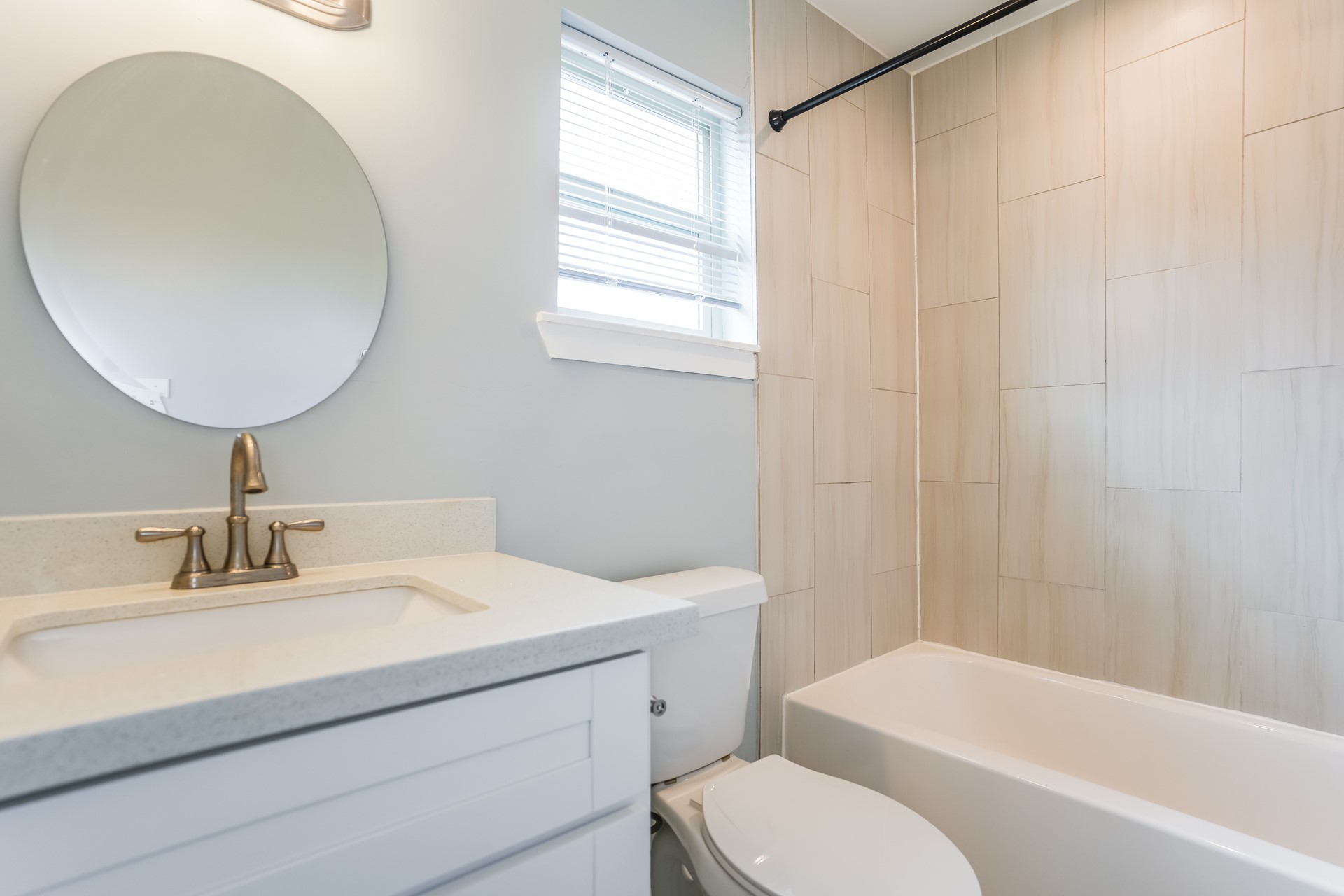 4801 Avenue H Austin, TX 78751 - Photo 6 of 16 Bathroom featuring vanity and shower combination