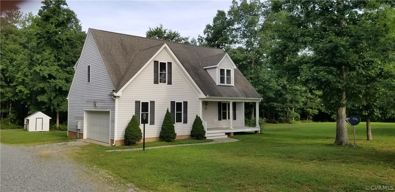 17175 Coatesville Road Beaverdam, VA 23015 - Photo 1 of 16 a view of a house with a yard and plants