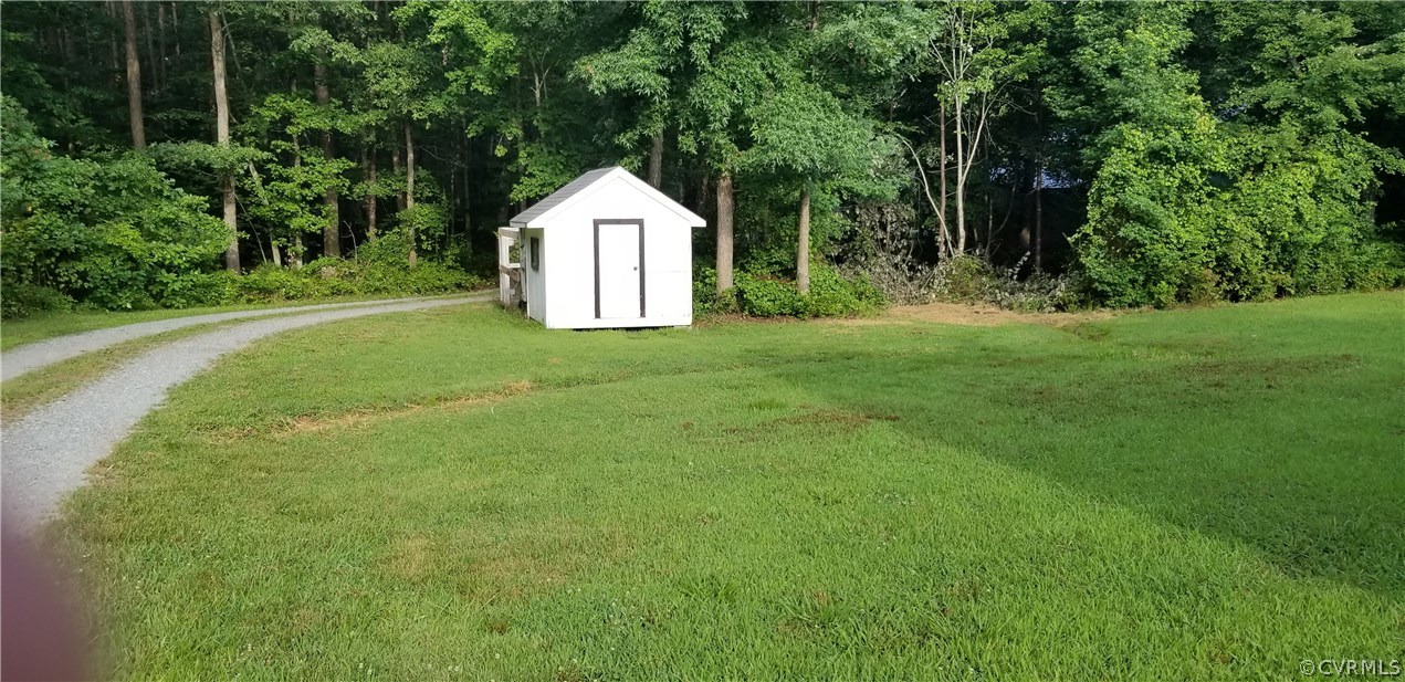 17175 Coatesville Road Beaverdam, VA 23015 - Photo 13 of 16 a view of backyard with green space