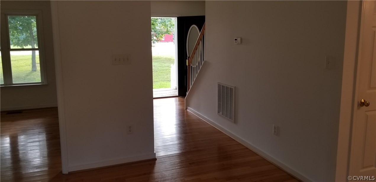 17175 Coatesville Road Beaverdam, VA 23015 - Photo 4 of 16 a view of hallway with wooden floor
