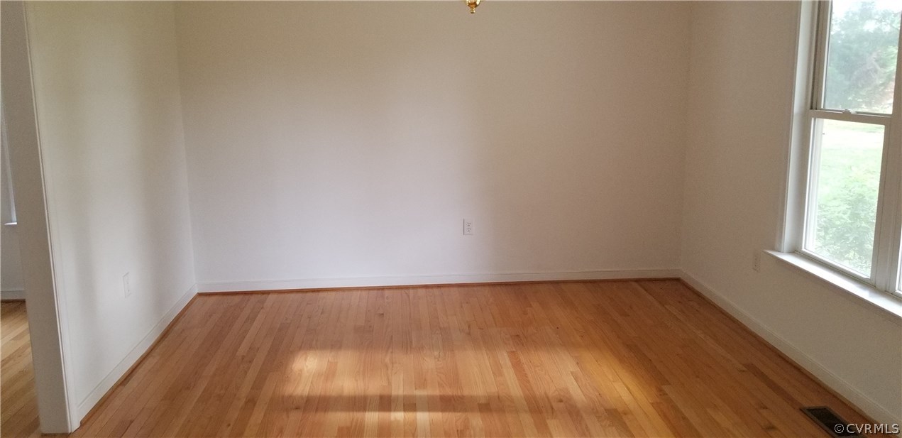17175 Coatesville Road Beaverdam, VA 23015 - Photo 7 of 16 a view of a room with wooden floor and a window