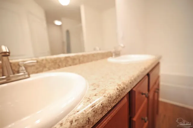 a view of kitchen and wooden floor