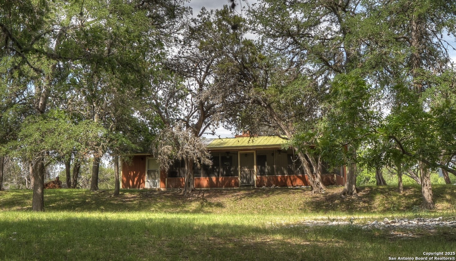 154 Weston Road Leakey, TX 78873 - Photo 17 of 39 a view of a house with a yard balcony and sitting area