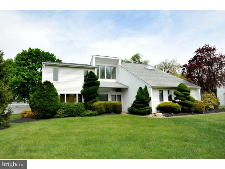 85 Kent Road Huntingdon Valley, PA 19006 - Photo 1 of 25 a front view of a house with a garden