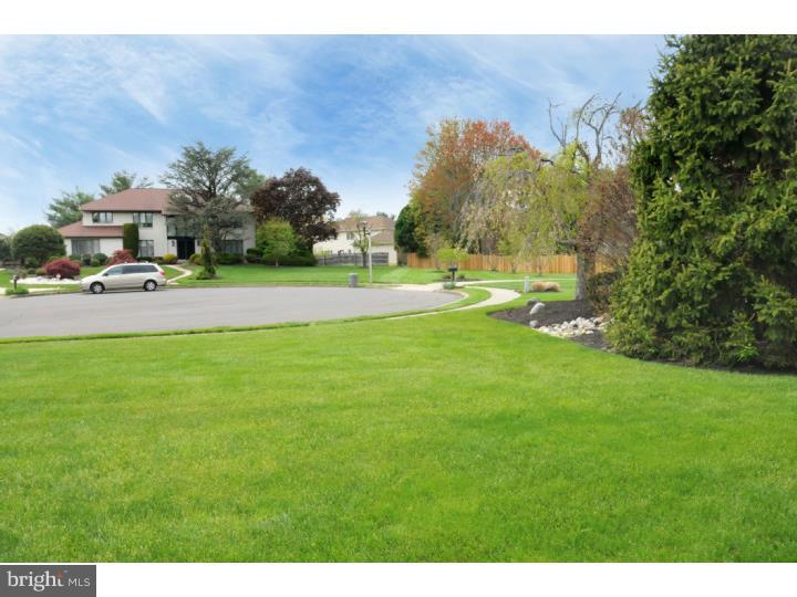 85 Kent Road Huntingdon Valley, PA 19006 - Photo 2 of 25 a view of yard with swimming pool and trees in the background