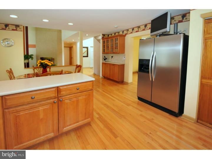 85 Kent Road Huntingdon Valley, PA 19006 - Photo 16 of 25 a kitchen with stainless steel appliances granite countertop a refrigerator a sink and a wooden cabinets