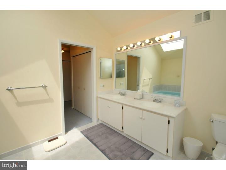 85 Kent Road Huntingdon Valley, PA 19006 - Photo 23 of 25 a bathroom with a double vanity sink and mirror