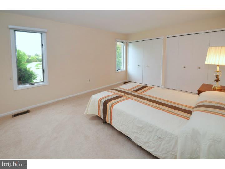 85 Kent Road Huntingdon Valley, PA 19006 - Photo 25 of 25 a bedroom with a bed and a window