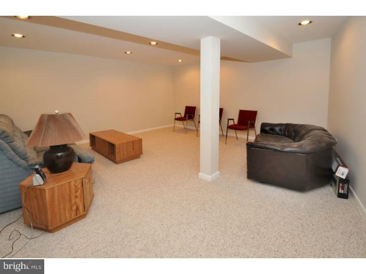 85 Kent Road Huntingdon Valley, PA 19006 - Photo 9 of 25 a living room with furniture and a air conditioner vent