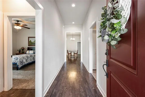 a view of a bedroom from a hallway
