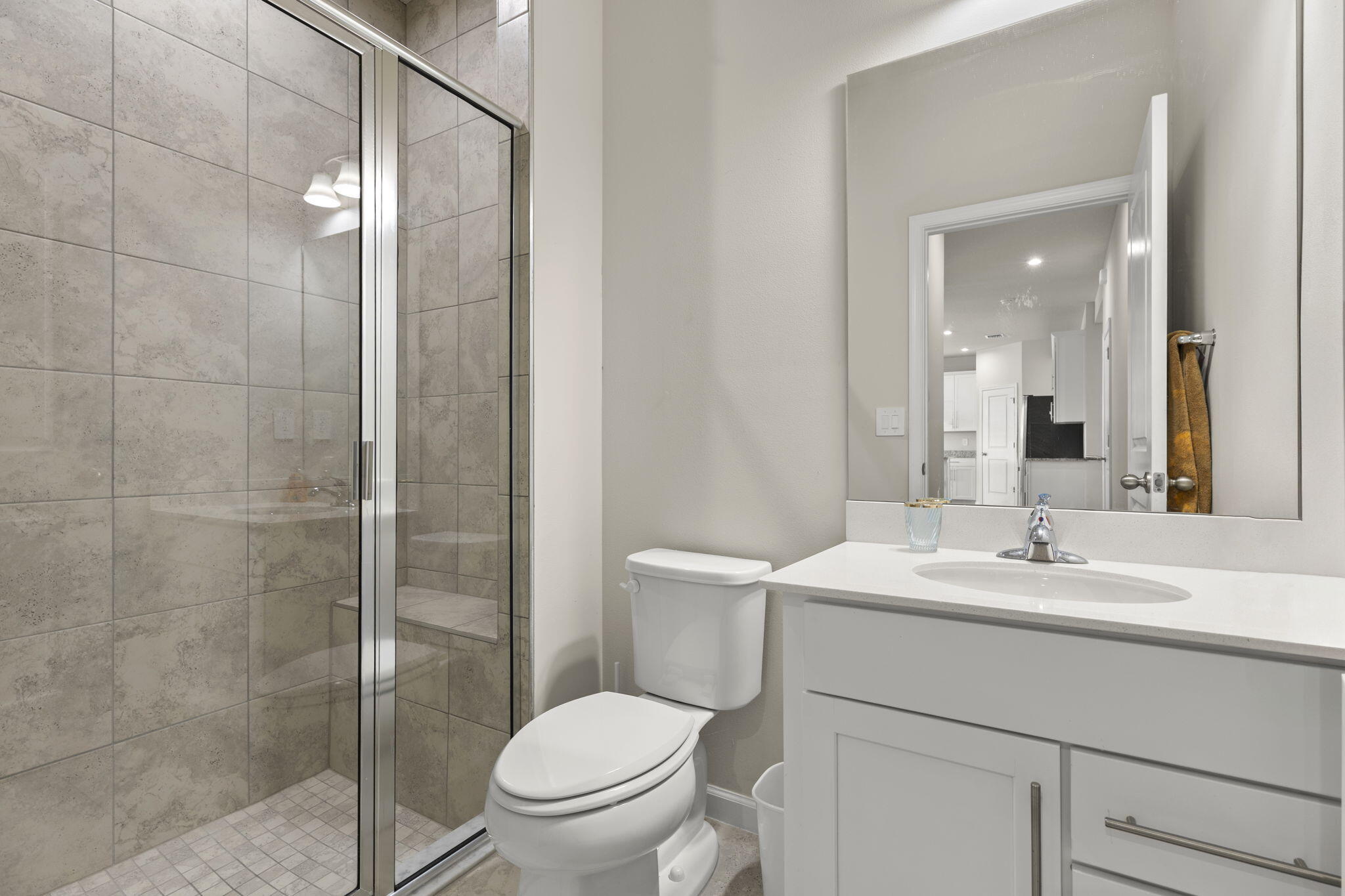 12291 Southwest Forli Way Port St. Lucie, FL 34987 - Photo 17 of 47 a bathroom with a sink toilet and shower