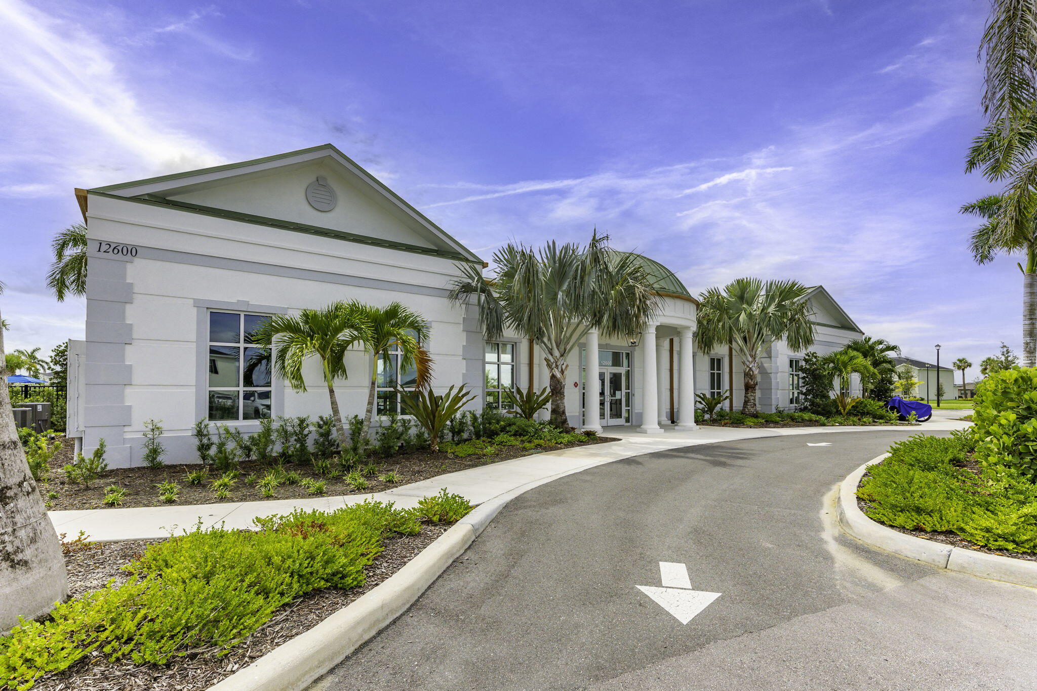 12291 Southwest Forli Way Port St. Lucie, FL 34987 - Photo 37 of 47 a front view of a house with a yard
