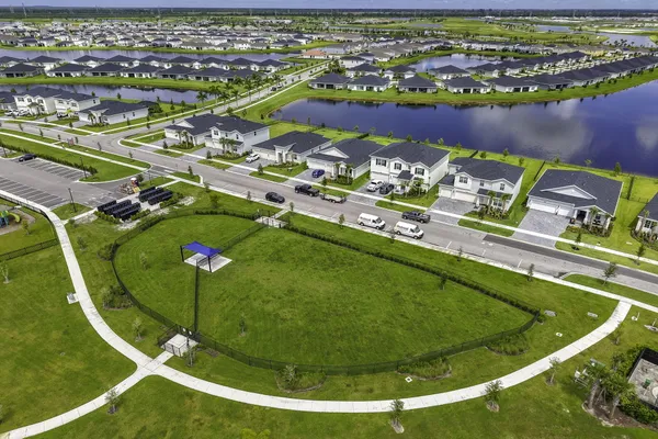 a view of a dining room with furniture wooden floor and chandelier