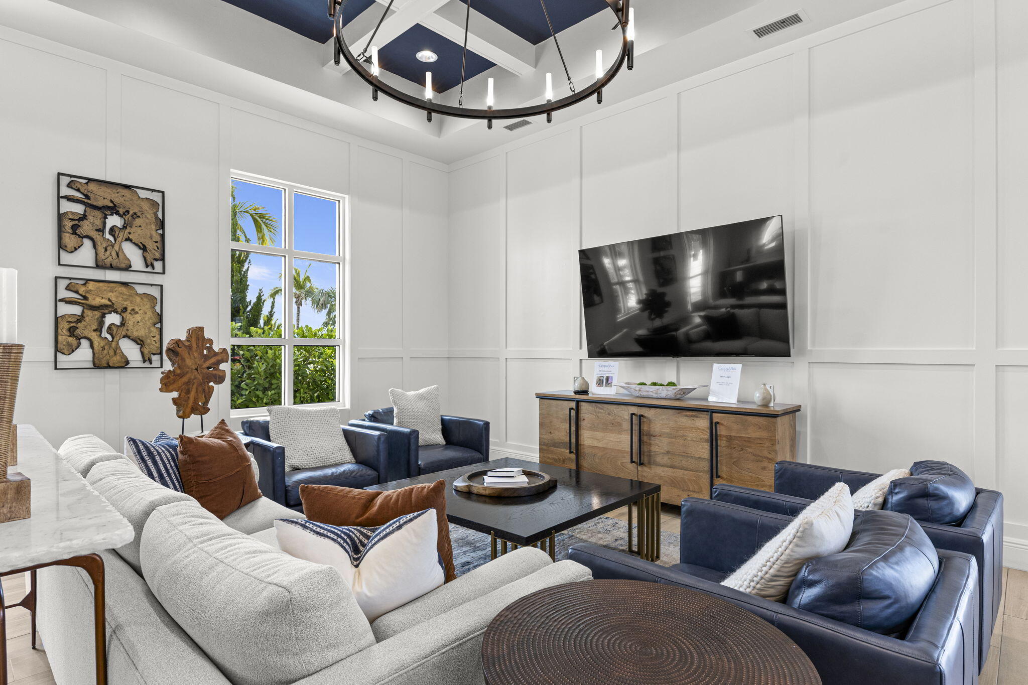 12291 Southwest Forli Way Port St. Lucie, FL 34987 - Photo 47 of 47 a living room with furniture and a flat screen tv