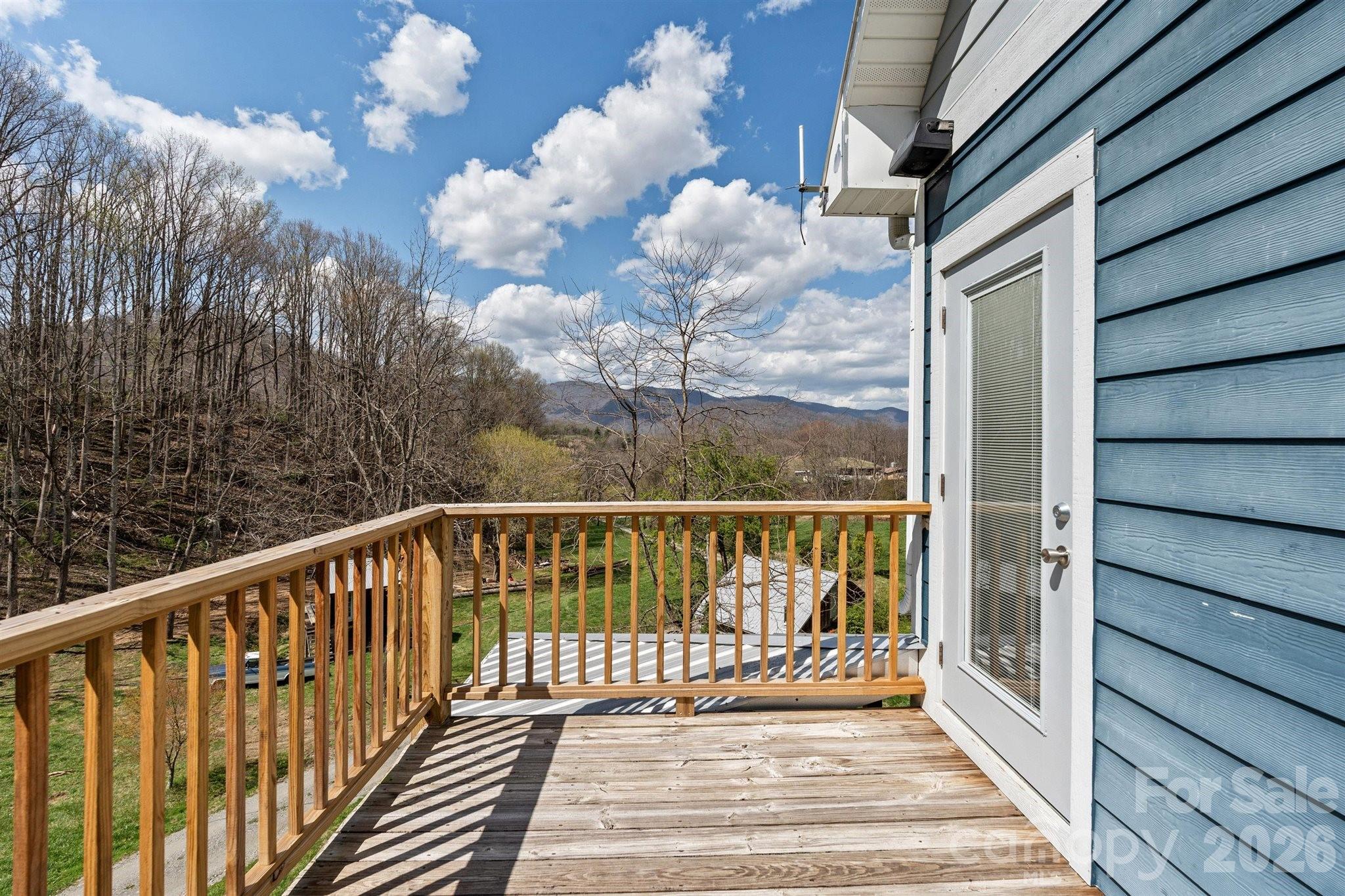 22 Pear Tree Lane Leicester, NC 28748 - Photo 20 of 47 a view of a balcony with wooden floor
