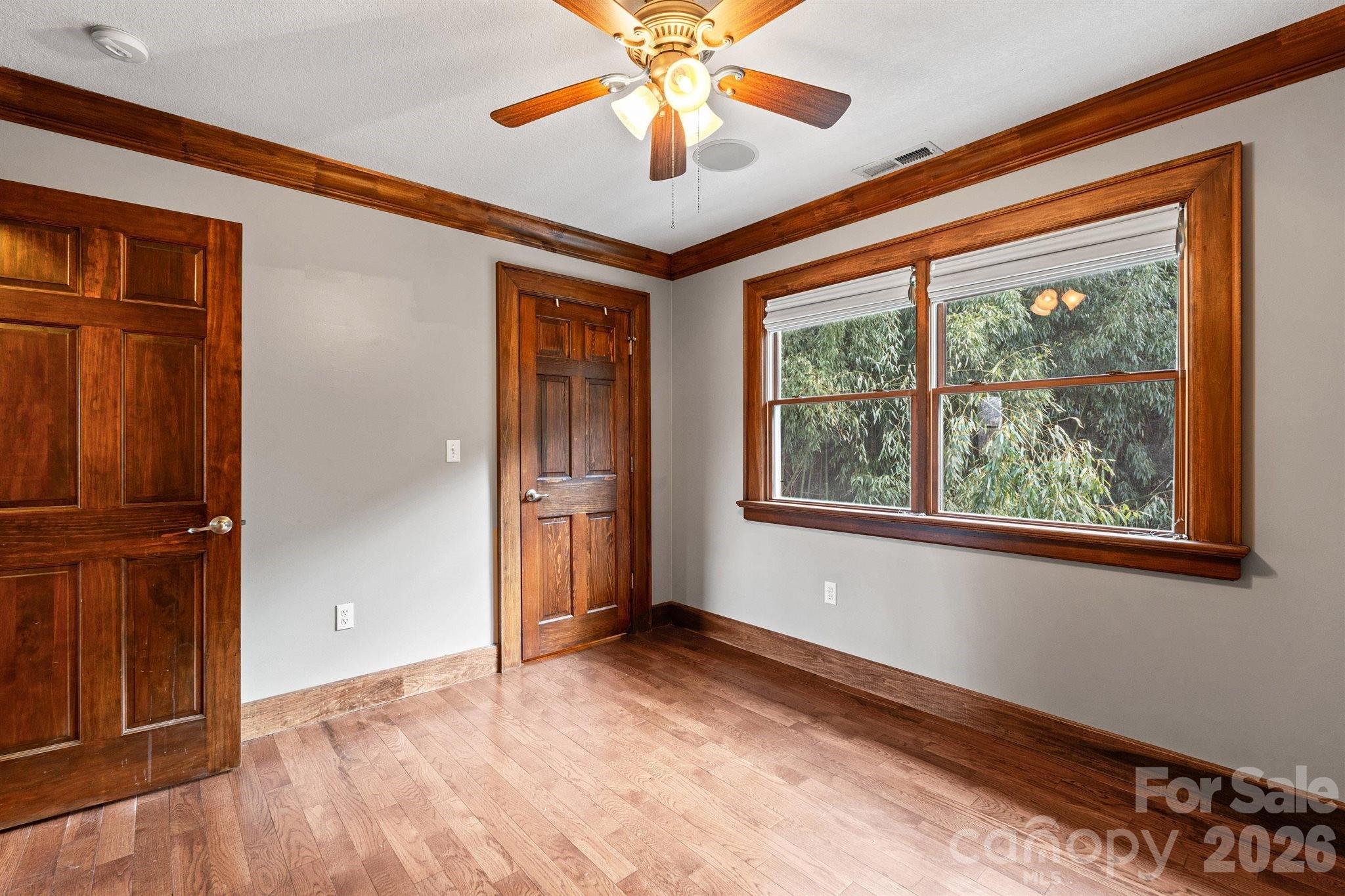 22 Pear Tree Lane Leicester, NC 28748 - Photo 28 of 47 a view of a livingroom with a ceiling fan and window