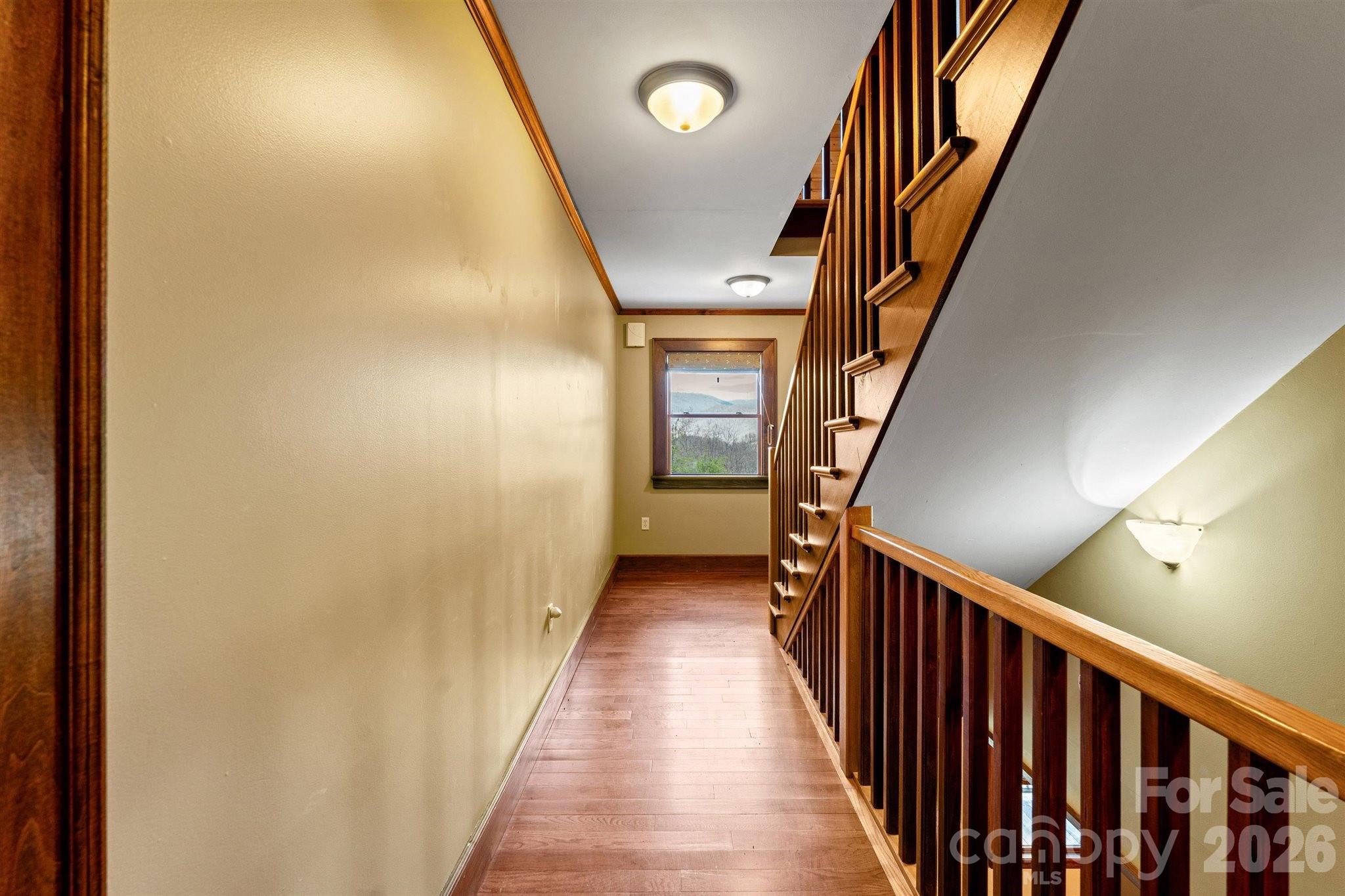 22 Pear Tree Lane Leicester, NC 28748 - Photo 29 of 47 a view of a hallway with wooden floor and entryway