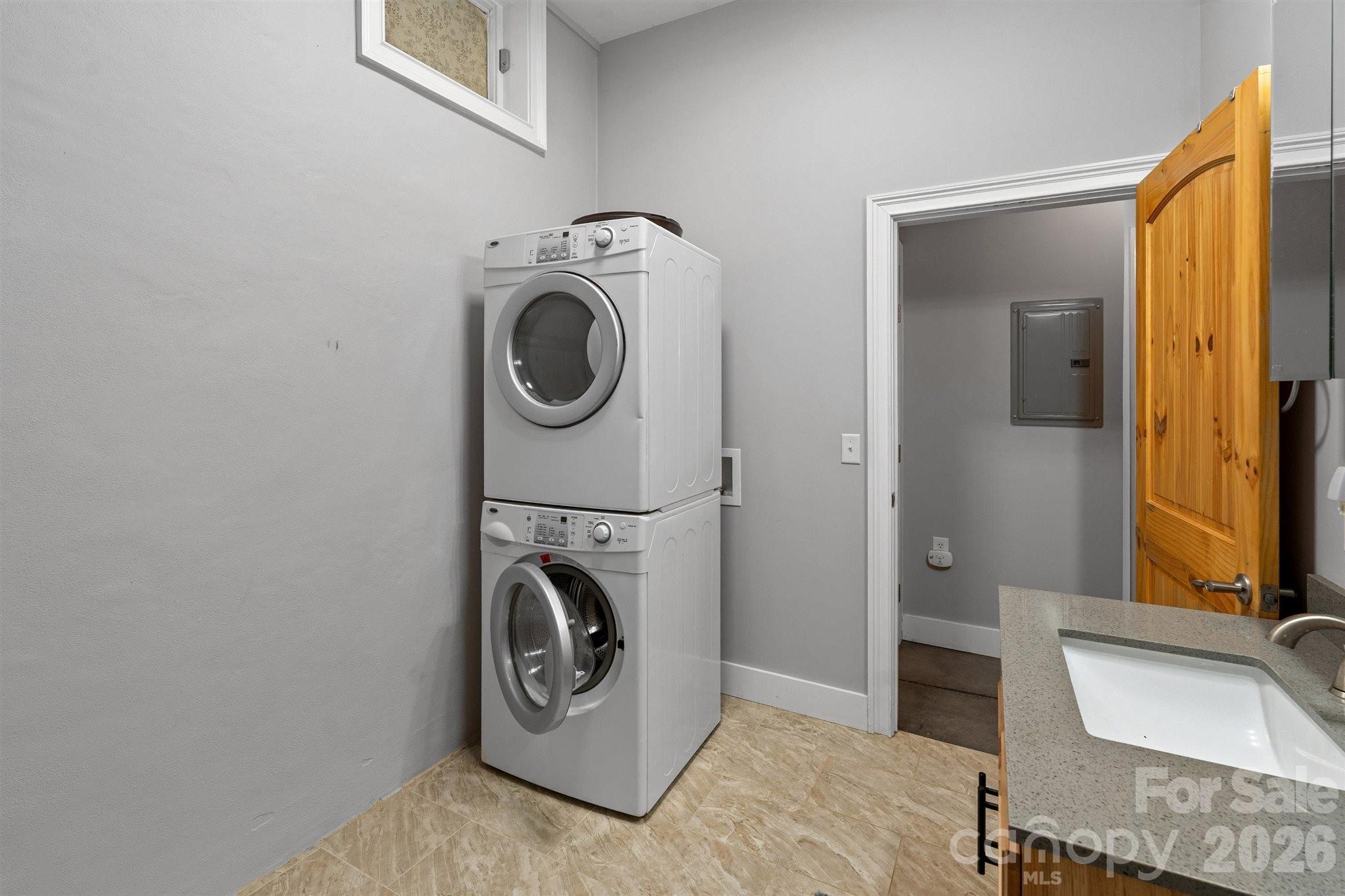 22 Pear Tree Lane Leicester, NC 28748 - Photo 41 of 47 a utility room with dryer and washer