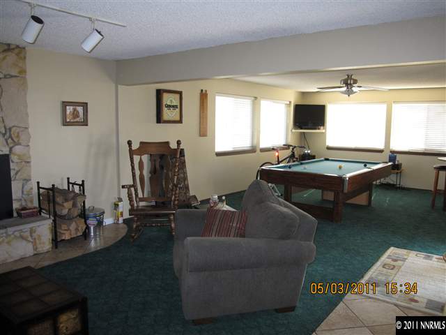 14595 Geronimo Trail Reno, NV 89521 - Photo 8 of 13 a living room with furniture and window