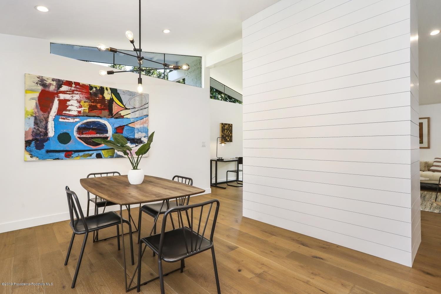 4817 Lockhaven Avenue Los Angeles, CA 90041 - Photo 11 of 34 a view of a dining room with furniture